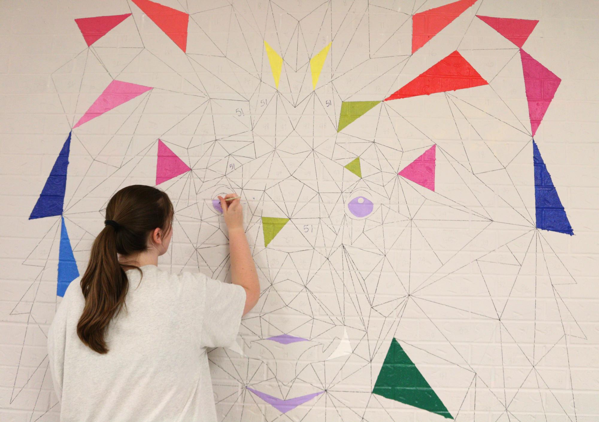 Lion Mural goes up in hallway