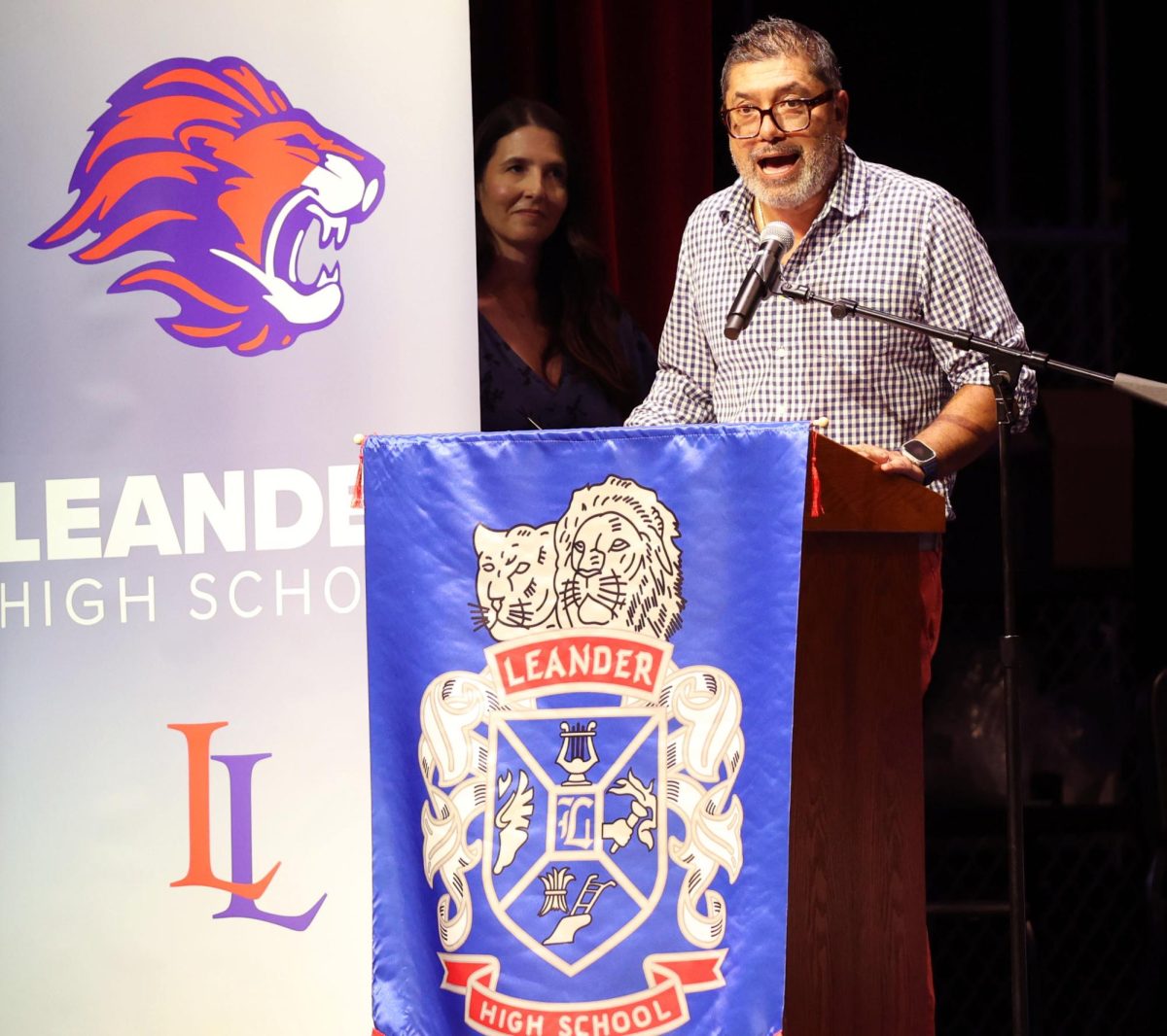 Counselor Angelo Malfatti annouces senior Franklin Rutschman. Malfatti was in charge of announcing students names and their achievements May 20. 